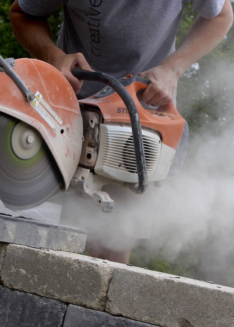 ExCL crew member working on a residential job site